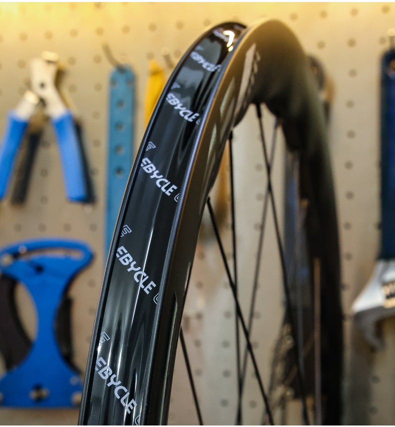 LeBycle tubeless rim tape being applied to a bicycle rim