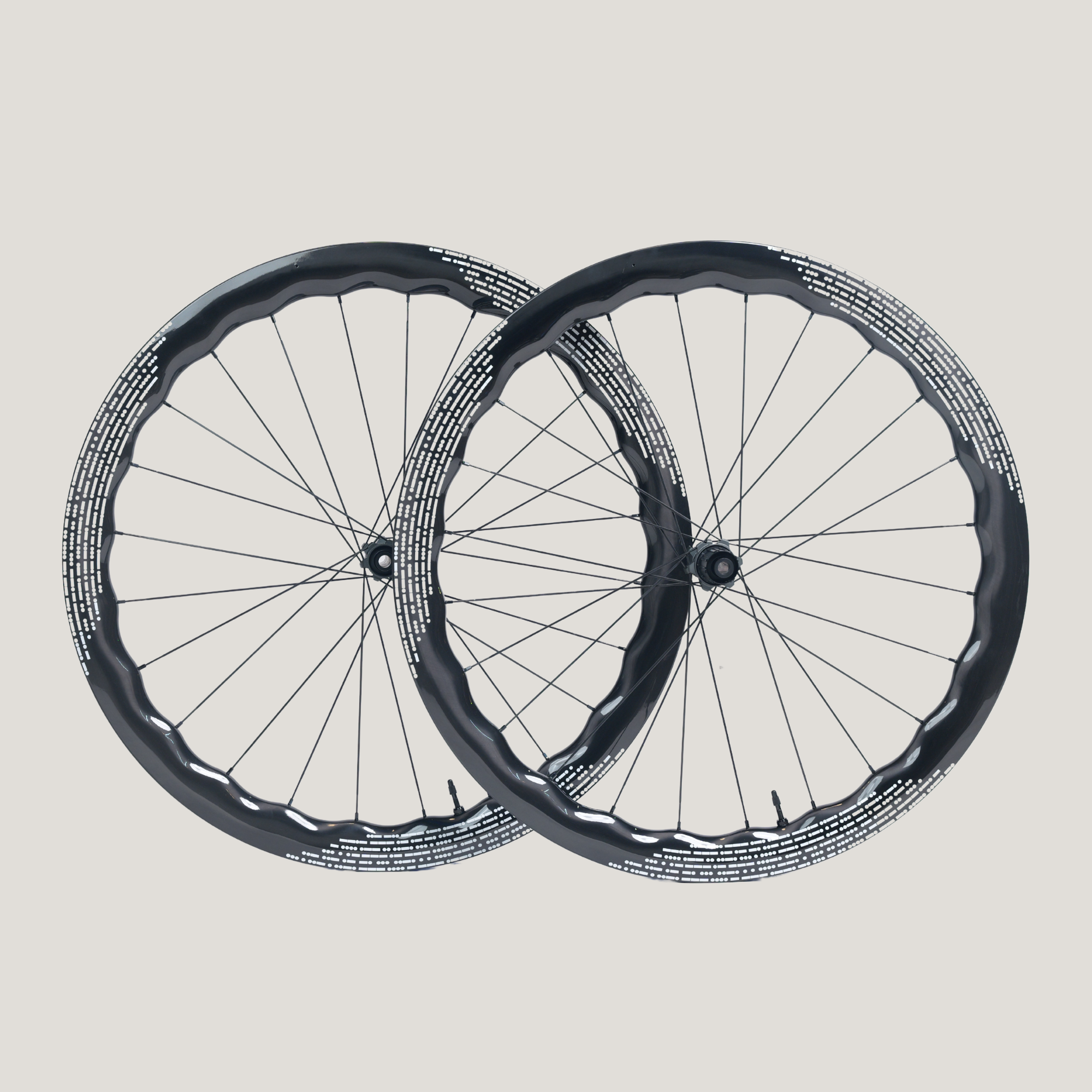 Nomad25 45/50 Wave Design Carbon Gravel wheelset- White Decal