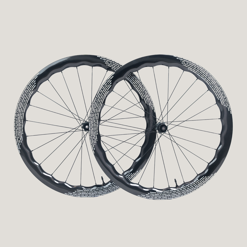 Nomad25 45/50 Wave Design Carbon Gravel wheelset- White Decal