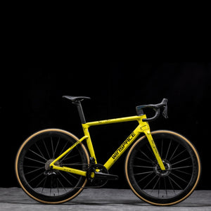 Yellow WINSPACE SLC5.0 carbon fiber road bike with tanwall tires and Shimano Ultegra Di2, disc brakes. Dark background.