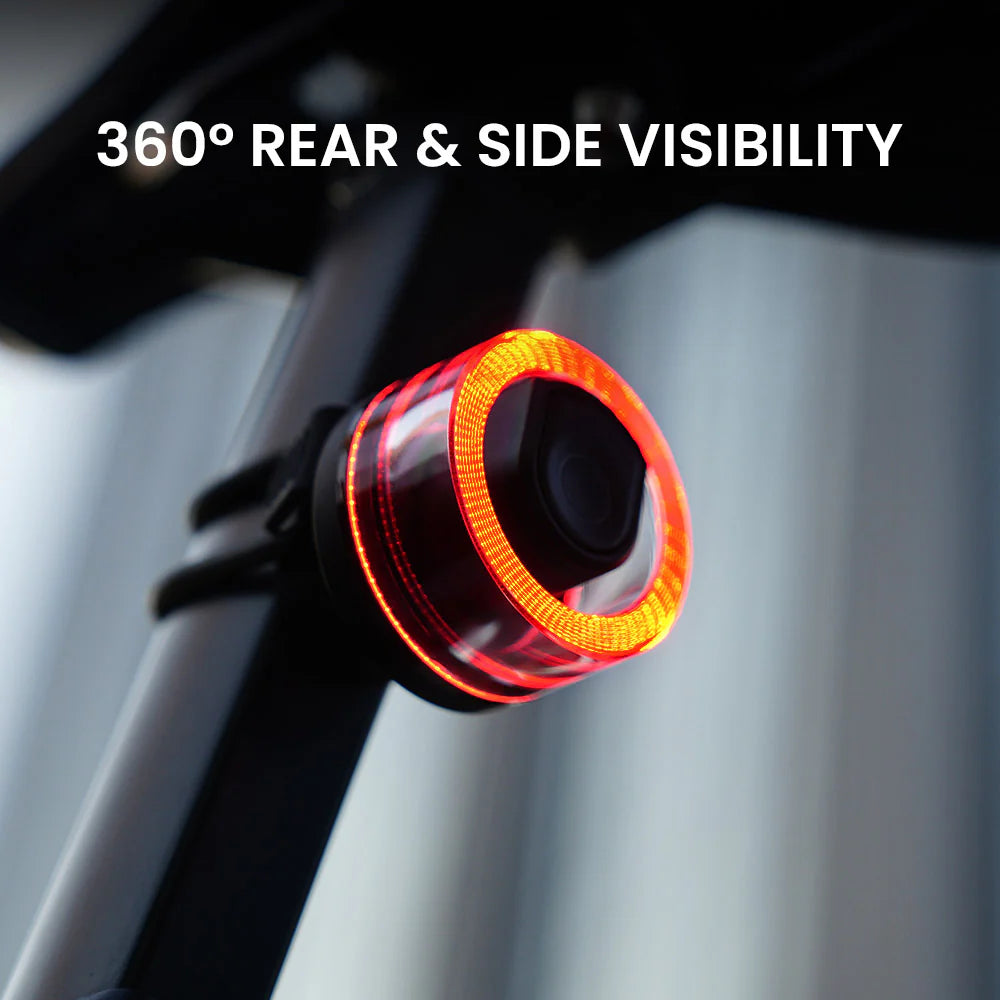 Vivi 50 smart rear bike light mounted on a seatpost showing full 360-degree red light ring