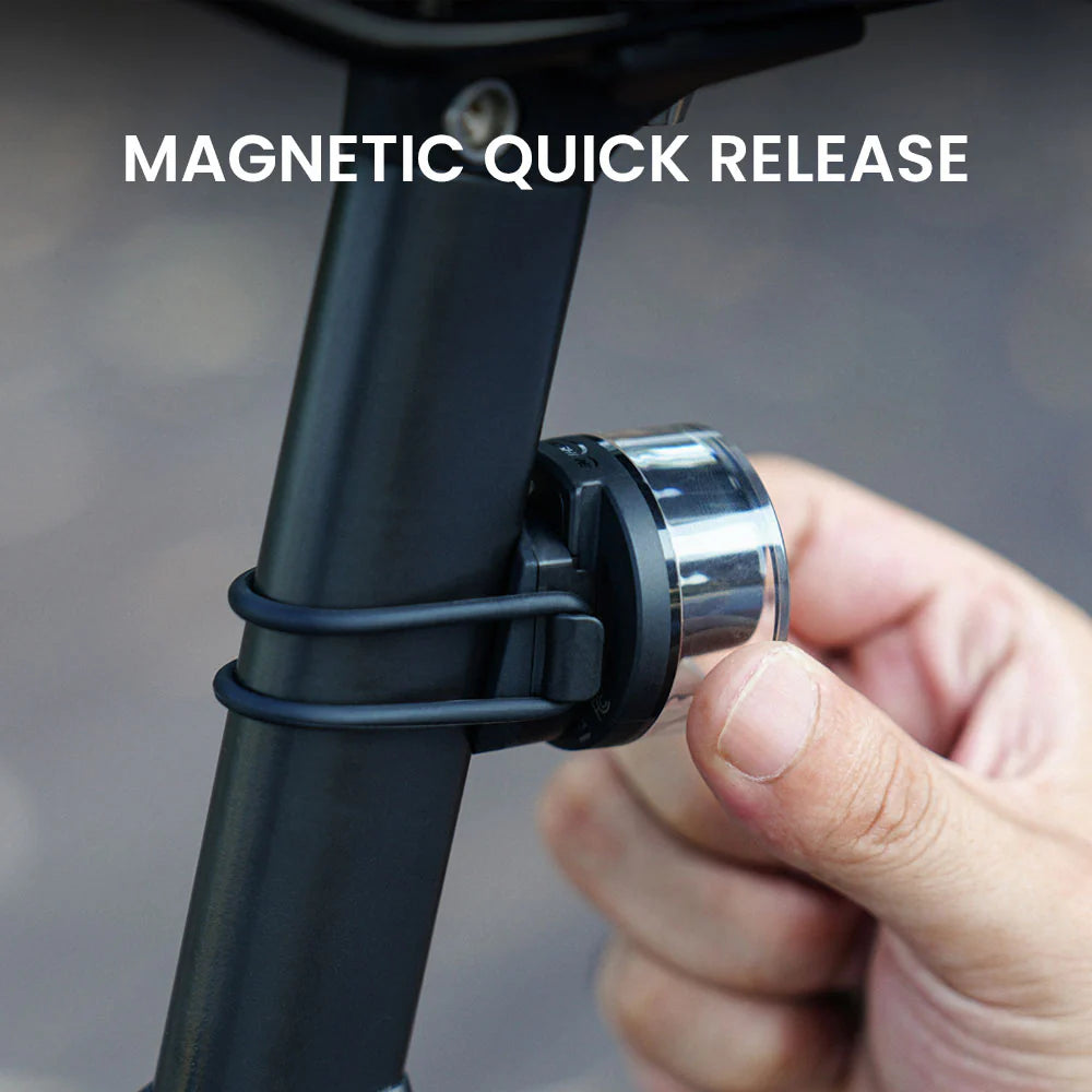 Removing the Vivi 50 light from its seatpost mount using the magnetic quick release