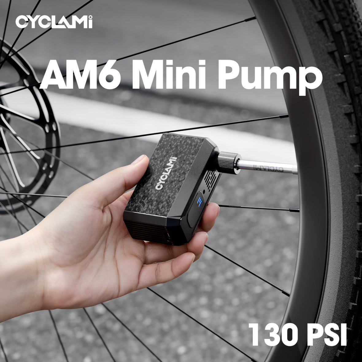 CYCLAMI AM6 Mini inflating a bicycle tire on the roadside