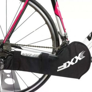XXF NC08 bike chain cover fitted over chainset, black with XXF logo